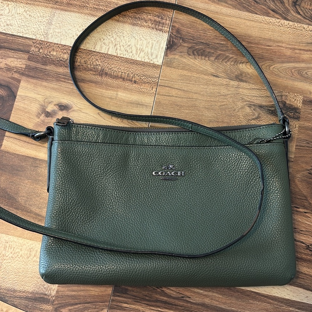 Dark green Coach crossbody purse